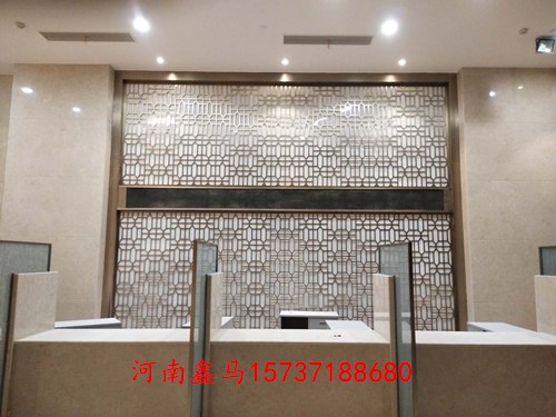 河南鑫马不锈钢制品有限公司安装的酒店服务台背景墙装饰